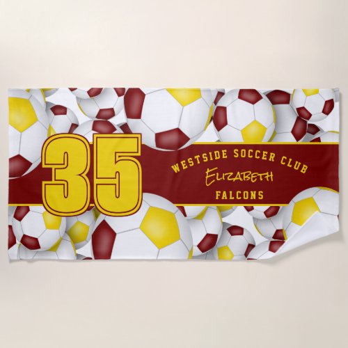 Lots of soccer balls maroon gold team colors gifts beach towel