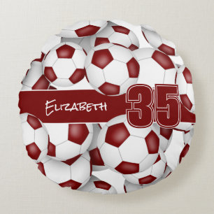 Lots of soccer balls maroon sports room decor round pillow