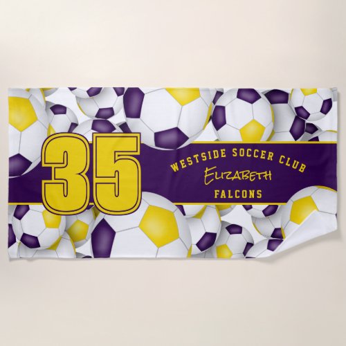 Lots of soccer balls purple gold team colors gifts beach towel