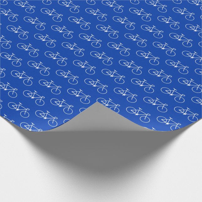 Lots of White Bicycle Shapes on Blue Wrapping Paper (Corner)