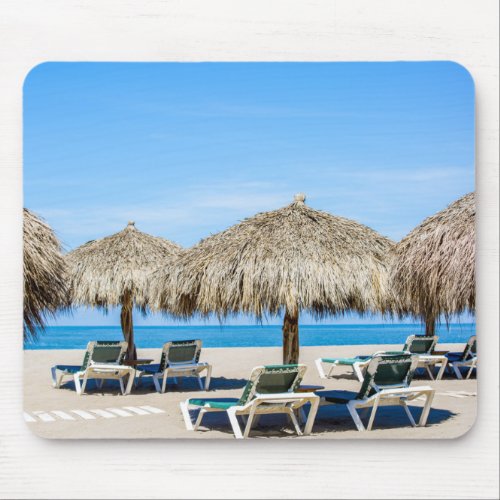 Lounge Chairs And Thatch Umbrellas On Beach Mouse Pad