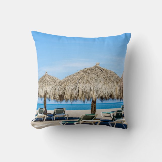 Lounge Chairs And Thatch Umbrellas On Beach Throw Pillow (Front)