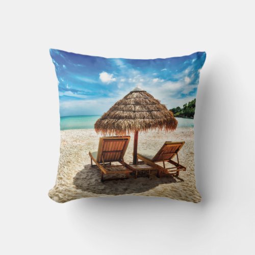 Lounge chairs on beach throw pillow