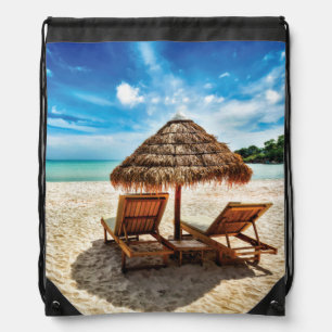 Lounge chairs on beach throw pillow drawstring bag