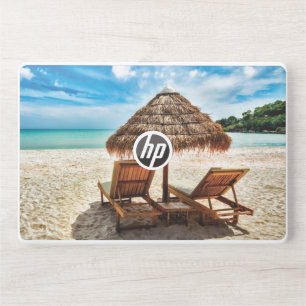 Lounge chairs on beach throw pillow HP laptop skin