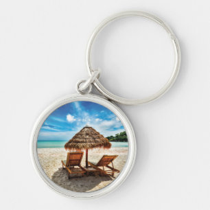 Lounge chairs on beach throw pillow keychain