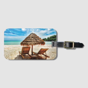 Lounge chairs on beach throw pillow luggage tag