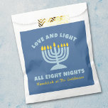 "Love and Light" Jewish Eight Nights of Hanukkah Favor Bag<br><div class="desc">Share the joy of Hanukkah with these "Love and Light All Eight Nights" favor bags! Featuring a serene blue background, a bright menorah illustration, and customizable family name text, these bags are perfect for filling with holiday treats, small gifts, or party favors for guests. Ideal for Hanukkah gatherings, these favor...</div>