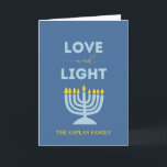 "Love and Light" Menorah Personalized Hanukkah Card<br><div class="desc">Send warm wishes for the Festival of Lights with this elegant "Love and Light" Hanukkah card. Featuring a glowing menorah design, a serene blue background, and customizable family text, this folded card is perfect for sharing heartfelt messages with loved ones. Whether you're celebrating all eight nights or sending blessings from...</div>