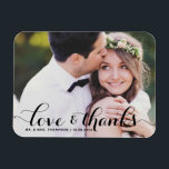 Love and Thanks | Black Calligraphy Photo Wedding Magnet<br><div class="desc">Celebrate your love and show gratitude with our customizable photo wedding thank you magnet! This unique keepsake is perfect for reminding your loved ones of your special day while expressing your heartfelt thanks in a memorable way. It features a modern typography photo overlay. Personalize by adding your photo and details....</div>