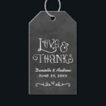 Love and Thanks Rustic Script Chalkboard Wedding Gift Tags<br><div class="desc">Charming chalkboard favor tags feature "Love and Thanks" with a custom wedding monogram in handwritten style fonts with a heart and scroll design accent that have a white chalk appearance. Background has a rustic black board textured appearance.</div>