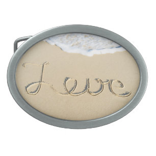 Love carved sign on the beach sand belt buckle