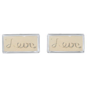 Love carved sign on the beach sand cufflinks