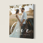 Love elegant calligraphy wedding photo faux canvas print<br><div class="desc">Showcase your favorite wedding pictures with this modern print,  with the word Love in a beautiful text overlay. You can easily change the color and size of the text to fit your picture.</div>
