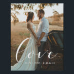 Love elegant calligraphy wedding photo faux canvas print<br><div class="desc">Showcase your favorite wedding pictures with this modern print,  with the word Love in a beautiful text overlay. You can easily change the color and size of the text to fit your picture.</div>