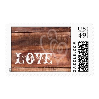 Love Hearts Barn Wood Rustic Wedding Postage Stamps at UniqueRusticWeddingInvitations.com