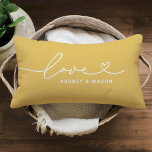 Love in Heart Script Golden Yellow Custom Monogram Lumbar Pillow<br><div class="desc">Modern and stylish custom lumbar throw pillow design features a simple and minimal "Love" typography design that includes flourish and heart details. Personalize the uppercase text below with a monogram for a couple or family,  a quote,  or other preferred text. The golden yellow and white colors can be modified.</div>