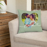 Love in Script Green Custom Heart Shaped Photo Throw Pillow<br><div class="desc">Modern and stylish custom throw pillow design features a favorite photo in a big heart shape with a minimal white "Love" typography overlay design that includes flourish and heart details. The leafy laurel green background color can be modified. A unique gift idea for a newlywed couple or for your loved...</div>