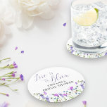 Love is in Bloom Purple Wildflower Bridal Shower Round Paper Coaster<br><div class="desc">Love is in Bloom Wildflower bridal shower coasters to personalize. Delicate and feminine botanical design is hand lettered with "love is in bloom" in elegant script calligraphy. It has a pretty border of watercolor wild flowers in shades of lilac, lavender, purple, pink and blue. A dainty modern floral with girly,...</div>