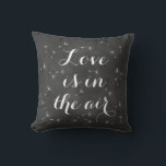 Love is in the Air Cushion<br><div class="desc">Delicate floating seeds and ribbon script on a soft chalkboard background accent this cushion. Love is in the air,  reminds us of dandelion wishes,  and romantic dreams,  making it perfect for the newlyweds or wedding sweetheart table. Scroll down to see other coordinating cushions.</div>