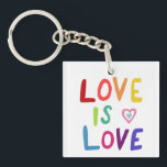 LOVE IS LOVE Colorful Rainbow Pride Keychain<br><div class="desc">Check out my shop for more pronouns, silly jokes, hiking, camping, vanlife, birds and lots more! You can also find this design on shirts, stickers, mugs, and buttons. Be sure to visit my shop for more designs too. Or if you'd like something custom please let me know. If you buy...</div>
