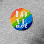 Love is Love Pride Rainbow Button<br><div class="desc">This Pride Button is decorated with LOVE IS LOVE in bold white letters on a watercolor rainbow background of red,  orange,  yellow,  green,  blue,  and purple.
Original Watercolor © Michele Davies.</div>