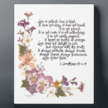 Love is patient plaque<br><div class="desc">Love is patient, love is kind... 1 Corinthians 13:4-8, popular and beloved biblical passage heard especially at weddings and anniversaries, presented here with pressed flowers and calligraphy by Simone Sheppard. Flowers from her garden include linaria, azalea, pansy and larkspur. Beautiful gift for anyone.</div>