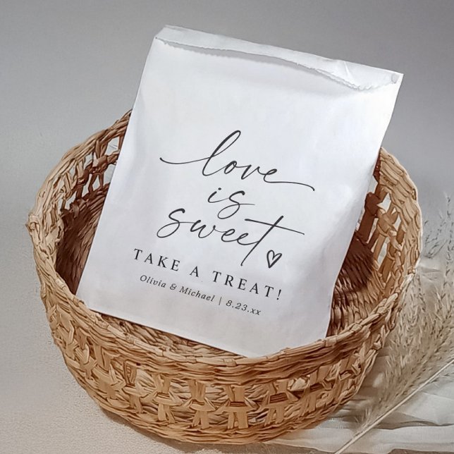 Love is Sweet Black and White Script Wedding Favor Bag (Modern black and white wedding favor bag with “Love Is Sweet” script and heart design)
