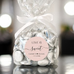Love Is Sweet Blush Pink Wedding Favor Classic Round Sticker<br><div class="desc">Chic blush pink sticker for your wedding reception dessert and candy favors featuring "Love Is Sweet" in simple modern typography and an elegant calligraphy script with swashes,  your first names joined together by a heart and your wedding date.</div>