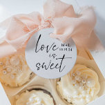 Love is Sweet Calligraphy Wedding Favor Tags<br><div class="desc">Elegant modern calligraphy "Love is Sweet" design in black and white. The font of the couple's name and date are customizable. There is a choice of paper,  twine is optional.</div>