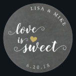 Love is Sweet Custom Wedding Favor Chalkboard Classic Round Sticker<br><div class="desc">Custom-designed wedding candy buffet favor stickers featuring gold glitter heart and "Love is Sweet" in elegant hand brushed script/calligraphy on a vintage rustic chalkboard background. Personalize this wedding favor sticker with bride and groom's names and wedding date for a touch of style to your wedding favors and gifts.</div>