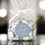 Love Is Sweet Dusty Blue Wedding Favor Classic Round Sticker<br><div class="desc">Chic dusty blue sticker for your wedding reception favors featuring "Love Is Sweet" in simple modern white typography and an elegant white script with swashes,  your first names joined together by a heart and your wedding date.</div>