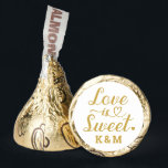 Love is Sweet Gold Heart Script Custom Wedding Hershey®'s Kisses®<br><div class="desc">Elegant, simple, and modern "Love is Sweet" wedding Hershey's Kisses chocolate candy favors feature a beautiful script typography design with scroll and heart accents. Personalize the custom monogram with the bride and groom couple's initials. Note, the gold and white colors can be updated to coordinate with your bridal shower or...</div>