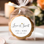 Love is Sweet Personalized Wedding Favor Classic Round Sticker<br><div class="desc">Custom-designed elegant wedding favor round stickers/labels featuring "love is sweet" in modern hand calligraphy with a gold glitter heart. Personalize with bride and groom's names and wedding date. Apply the stickers/labels on boxes,  bags,  or jars for unique DIY wedding candy favors/gifts.</div>