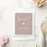 Love Is Sweet Personalized Wedding Favor Hot Chocolate Drink Mix<br><div class="desc">A perfect party favor for your rehearsal dinner,  engagement party,  or wedding,  drink mix packets feature white handwritten lettering on a dusty rose pink taupe background with a small heart illustration in the center. "Love Is Sweet" appears at the top,  with your event name and date beneath.</div>