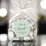 Love Is Sweet Sage Green Wedding Favor Classic Round Sticker<br><div class="desc">Chic sage green sticker for your wedding reception favors featuring "Love Is Sweet" in simple modern typography and an elegant calligraphy swash script,  your first names joined together by a heart and your wedding date.</div>