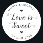 Love is Sweet Wedding Simple Rustic Black Script Classic Round Sticker<br><div class="desc">A Classic Black Thank You Wedding Sticker featuring "Love is Sweet" in a rustic modern elegant font calligraphy. 
You can easily personalized it with your names and wedding date.</div>