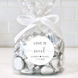 Love Is Sweet Wedding Thank You Classic Round Sticker<br><div class="desc">Elegant thank you sticker for your wedding reception favors featuring "Love Is Sweet" in simple modern typography and a stylish elegant script with swashes,  your first names joined together by a heart and your wedding date.</div>