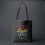 Love Light Latkes Funny Hanukkah Bright on Black Tote Bag<br><div class="desc">Practical and Fun- the perfect combination, This Love Light Latkes Black Hanukkah Funny Quote Tote will set a festive Chanukah tone wherever it goes this Holiday Season! Sure to make friends & family smile. The colorful, humorous saying really stands out on the black starry-night background. Includes space for your message...</div>