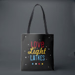 Love Light Latkes Funny Hanukkah Bright on Black Tote Bag<br><div class="desc">Practical and Fun- the perfect combination, This Love Light Latkes Black Hanukkah Funny Quote Tote will set a festive Chanukah tone wherever it goes this Holiday Season! Sure to make friends & family smile. The colorful, humorous saying really stands out on the black starry-night background. Includes space for your message...</div>