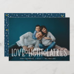 Love, Light & Latkes | Hanukkah Photo Card<br><div class="desc">Cute and lighthearted Hanukkah photo card features your favorite horizontal or landscape oriented photo with "love,  light,  latkes" overlaid in white lettering accented with stars of David. Personalize with your Hanukkah greeting,  names and the year beneath. Cards reverse to a pattern of snow and stars on dark blue.</div>
