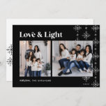 Love & Light | Modern Snowflakes Hanukkah Holiday Card<br><div class="desc">A modern and festive design for your holiday greetings featuring two photos aligned side by side, on a classic black background adorned with snowflake garlands along the right side. "Love & Light" appears across the top in retro lettering, with your family name and the year along the bottom. A modern...</div>