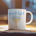Love & Light Personalized Hanukkah Menorah Gift Coffee Mug<br><div class="desc">Cute customizable Love and Light Hanukkah mug for a Jewish family breakfast or a Chanukah party with a synagogue. Personalize this pretty gift with your own last name or group information in blue under the pretty gold menorah.</div>