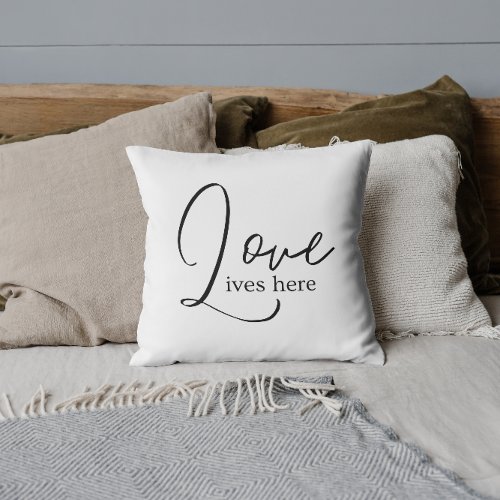 Love Lives Here Throw Pillow