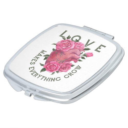 Love makes everything grow      compact mirror