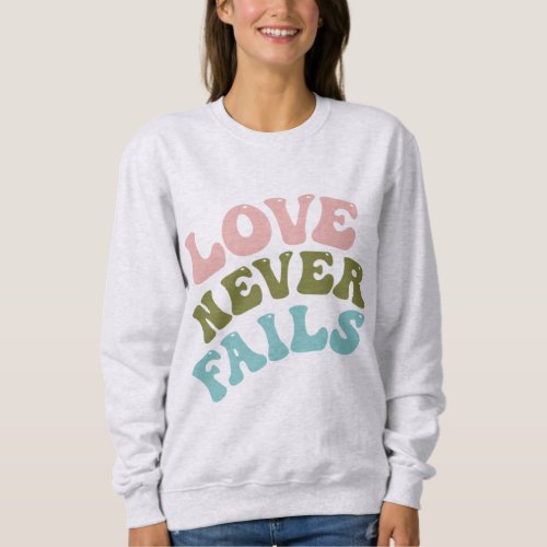 Love Never Fails Sweatshirt