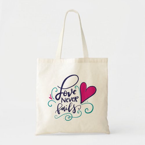 Love never fails tote bag