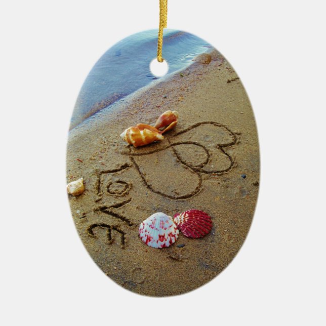 Love on beach w/  hearts ceramic ornament (Front)