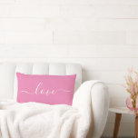 LOVE | Pink and White Reversible Lumbar Pillow<br><div class="desc">This custom throw pillow features a modern script font that reads "love", scrolled across both sides with inverse, reversible colors. Personalization, such as a name or message, can easily be added by clicking "customize further". Makes a great gift for Valentines Day, newlyweds or just to freshen up the decor. Other...</div>