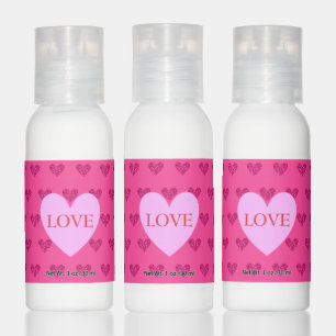 Love pink heart and heart pattern on fuchsia pink hand lotion
